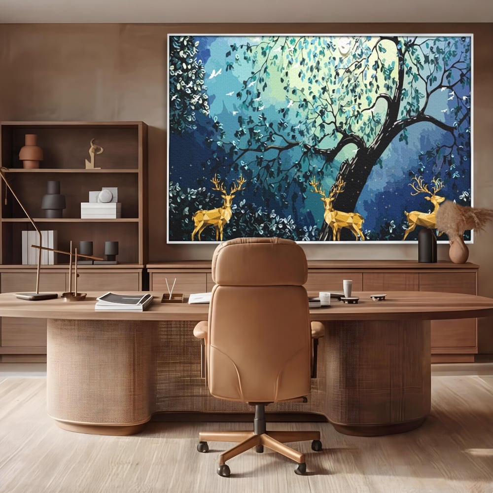 Tablou canvas cu tablou canvas cu cerbi aurii si padure nocturna, in rama de aluminiu argintiu, pe perete intr-un birou